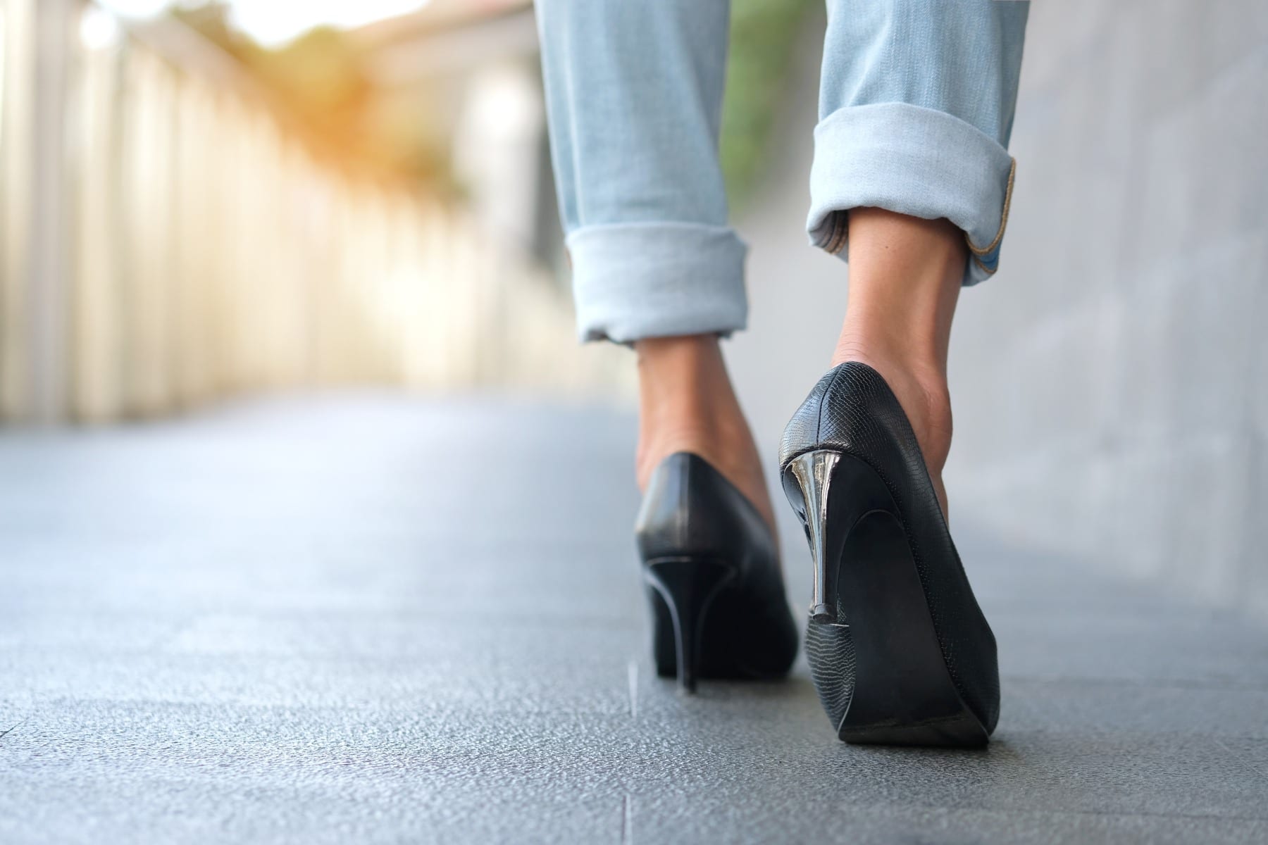woman walking in high heels